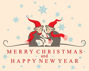 Christmas card with two cute monkeys in Santa hats.