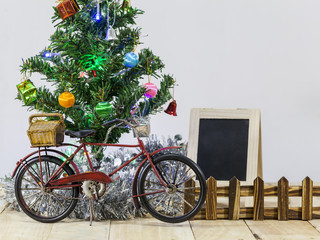 Christmas trees adorned with beautiful bike and blackboard.
