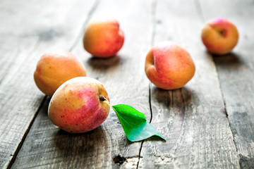Fresh apricots on wooden background. fruit