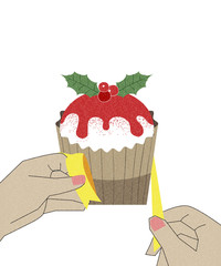 Hands wrapping cupcake for Christmas