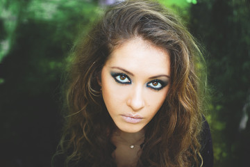 Beauty model girl with makeup smoky eyes