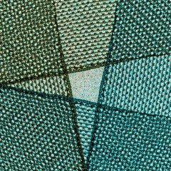 fabrics of different textures as green-blue background