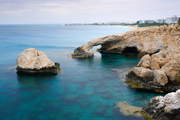 Fototapeta na wymiar Rock arch with turquoise sea water near Ayia NapaCyprus