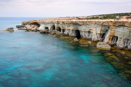 View Sea caves near Cape Greko. Mediterranean Sea. Cyprus