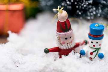 Christmas ornaments on snow