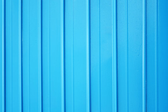 The metallic door in blue color of warehouse