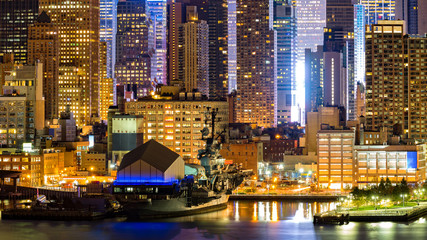 Midtown Manhattan skyscrapers border Hudson River near pier 86,