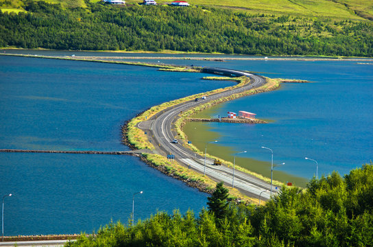 Road accross fjord at city of Akureyri, north Iceland