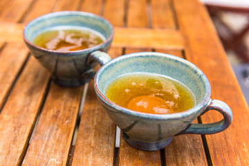Norman apple cider in a typical ceramic cups