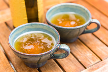 Norman apple cider in a typical ceramic cups