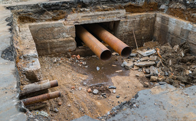 Repair and replacement of city sewer on the street.