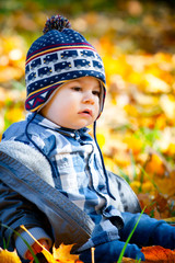 8 months old boy in the fall