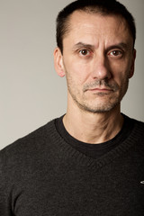 Obraz premium Close up portrait of serious mature man