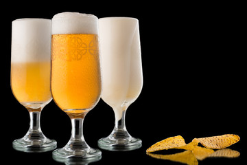 Glasses of beer and nachos