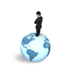 Thinking businessman standing on globe world map