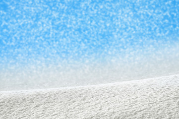 Winter background with snow-drifts and blue sky