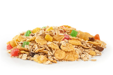 Muesli with dried fruit and candied fruit on a white background.