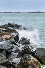 Waves Crash against a Rockwall