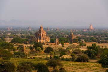 Fototapeta na wymiar Sunset in Bagan, Myanmar. Bagan is ancient city with thousands of ancient temples in Myanmar.