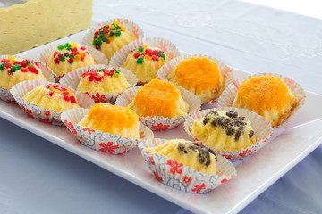 Delicious cupcake on table