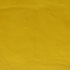 Yellow concrete wall background