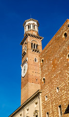 Fototapeta na wymiar Clock tower of Palazzo della Ragione in Verona - Italy