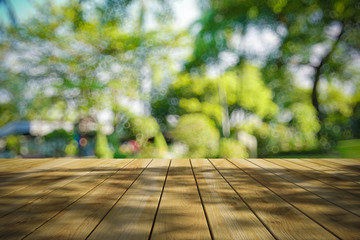 Perspective wood and bokeh light background