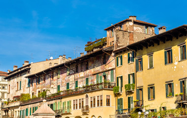 Fototapeta na wymiar Buildings on Piazza delle Erbe in Verona - Italy