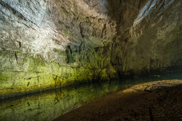 Underground river in Planina Cave
