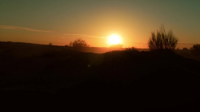 camera car in the sahara desert at sunset