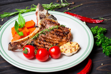 Steak with vegetable garnish