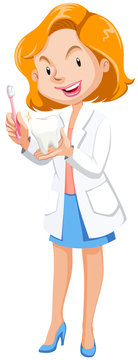 Female dentist with tooth model and brush