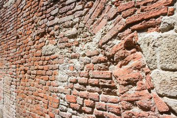 Medieval stone and brick wall (Italy)
