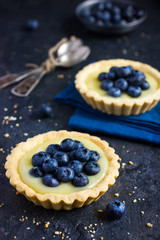 Tart with lemon curd and fresh blueberry