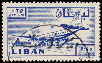 Stamp printed in Lebanon shows Douglas DC-6B plane