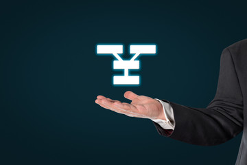 Businessman holding a communication symbol