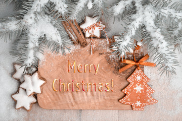 Christmas greeting card with seasonal decorations and cookies