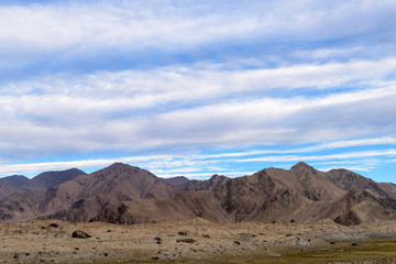Fototapeta na wymiar Landscape of Karakul lake, in Xinjiang province of China lies on the Karakoram Highway linking Kashgar in China with Islamabad in Pakistan. It's in the Pamir mountain range.
