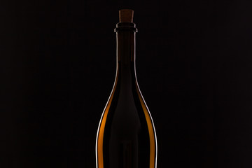 Detail of bottle with red wine