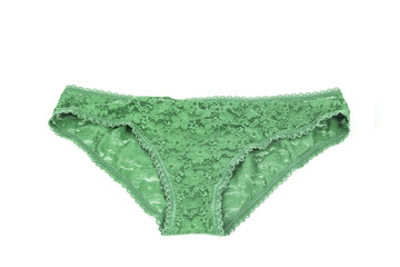 Bragas verdes de mujer lencería sobre fondo blanco aislado. Vista superior. Copy space