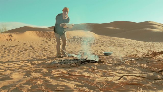 sahara man cooking bread