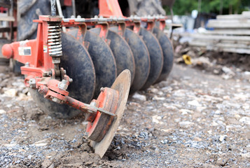 Tractor with metal blade