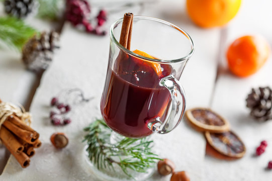 Holiday winter hot drink. Mulled wine with fruits and spices.