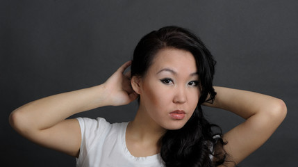 Fototapeta premium Portrait of asian woman on black background