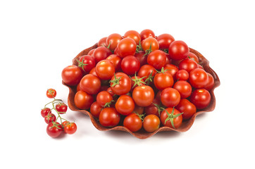Ripe red cherry tomatoes isolated