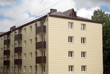Houses in a residential district after major overhaul in cloudy sumer day