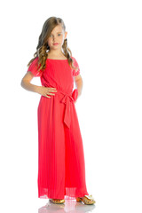 Portrait of a smiling girl looking at the camera. Studio shot, isolated on white