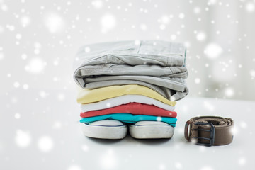 close up of clothes and accessories on table