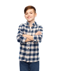 smiling boy in checkered shirt and jeans