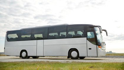 tour bus driving outdoors